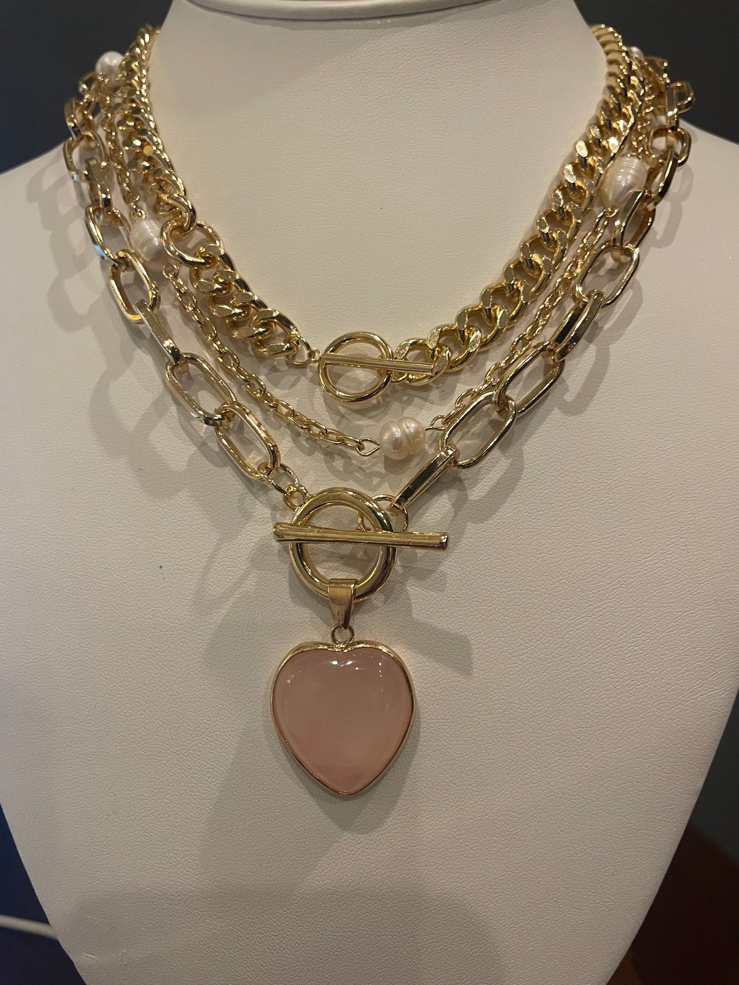 Multi layer Fashion 3 set gold tone necklace.